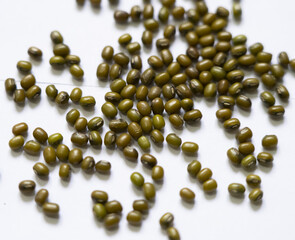 Mung beans or Green moong dal isolated on white background