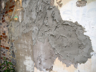 Fragment of a carelessly plastered wall