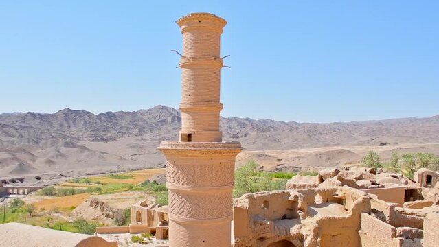 Traditional Wind-catcher on rooftop of Kharanaq historical village in Iran