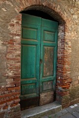 Italy, Tuscany: Old doorway of the stones house.