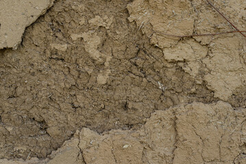 The concrete texture, wall, with cracks and scratches can be used as a background