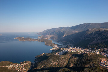 Aerial view of touristic Kas district with its green nature and deep blue sea. Antalya - Turkey
