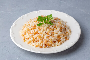 Traditional delicious Turkish food; Turkish style rice pilaf (Turkish name; Arpa sehriyeli pirinc pilavi)