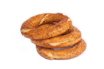 Turkish fast food bagel called Simit. Turkish bagel Simit with sesame. Bagel is traditional Turkish bakery food. Turkish name; simit - gevrek