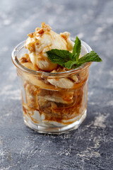 ice cream with fresh fruits and syrup