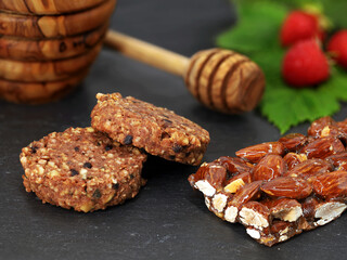 Almond bar and muesli cookies refined with honey and fruit, healthy protein snack for a high-fiber diet
