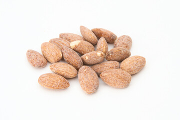 Obraz premium coated flavored almonds isolated on white 