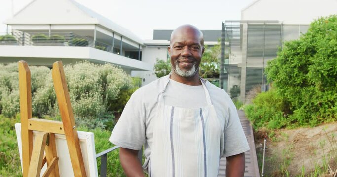 Video of happy senior african american men painting