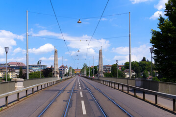 Fototapeta na wymiar Kornhaus (Granary) Bridge at City of Bern, capital of Switzerland, on a blue cloudy summer day. Photo taken June 16th, 2022, Bern, Switzerland.