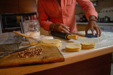 person kneading dough