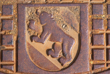 Coat of arms of City and Canton Bern on manhole at City of Bern on a sunny summer day. Photo taken June 16th, 2022, Bern, Switzerland.