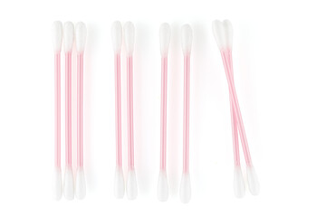 Cosmetic cotton swabs. Cotton buds with a plastic core on a white background. Full depth of field. Close-up.