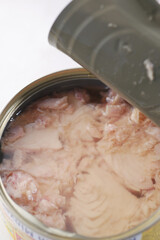 canned tuna on wooden table ,