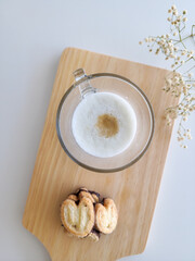 Selective focus of latte macchiato coffee and palmiers biscuits with chocolate