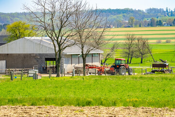 Fototapeta premium Amish country, farm, home and barn on field agriculture in Lancaster, Pennsylvania, PA US North America