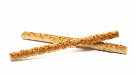 Pretzel bread sticks with sesame seeds, snacks isolated on white  