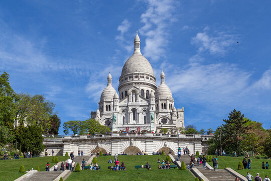 Paris, France - May 12, 2017: Front view of the famous basilica Sacre coeur in Montmartre district with people in front