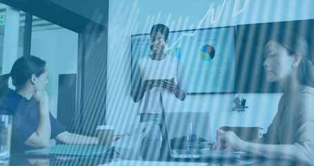 Animation of data processing over diverse business people at meeting in office - Powered by Adobe