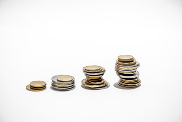 Euro Coin stacks on a white background , Finance and banking concept.