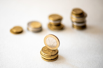 Euro Coin stacks on a white background , Finance and banking concept.