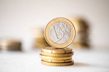 Euro Coin stacks on a white background , Finance and banking concept.