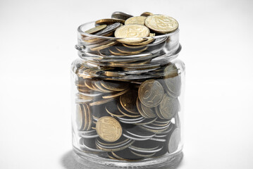 Jar of Money Isolated on a White Background