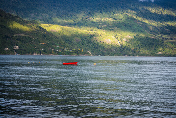 Obraz premium boat on the coast of cochamo city located in the south of chile