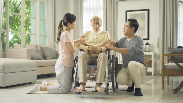 Portrait of happy smiling Asian Family living together at home in family relationship. reunion. Love of father, daughter, grandfather and son. People lifestyle.