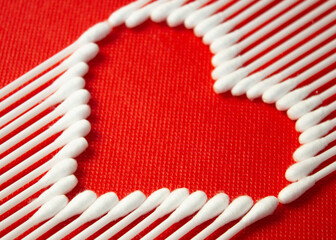 cotton buds on a colored background. 100% bavovna, used both in medicine and in cosmetology