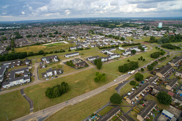 Fototapeta na wymiar Arial view of suburban housing and shops Bransholme. Kingston upon Hull. Yorkshire 