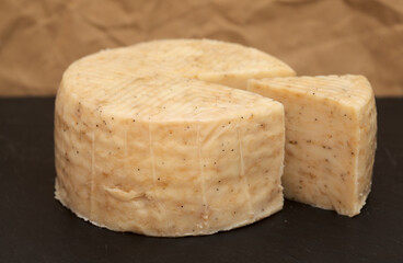 Produce of Spain - mixed milk specialty cheese with black garlic inclusions