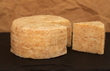 Produce of Spain - mixed milk specialty cheese with black garlic