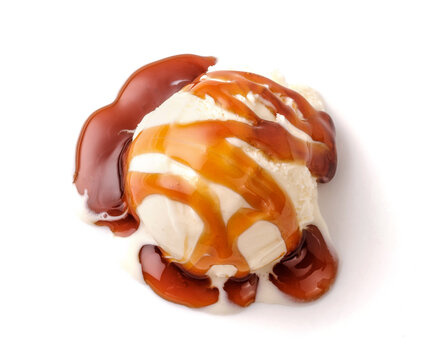 Ice cream ball with caramel sauce on white. Top view of Ice cream isolated.