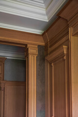 Wooden trim with moldings in a stylish interior
