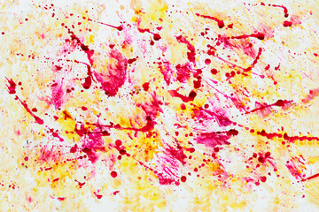 Hand painted brush strokes on paper background, stains, blobs of yellow and pink colors