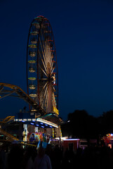 Obraz premium Fairground rides at night