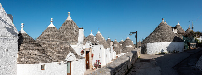 Iconic residential houses in historic Trulli district in Alberobello, Southern Italy