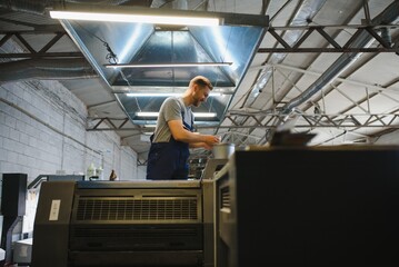 Factory worker. Man working on the production line.