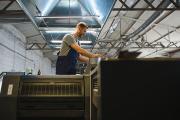 Factory worker. Man working on the production line.