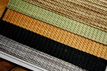 Catalog of different shades of fabric colors. Variety of color of dense fabric. Color palette