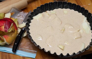Process of making the handmade home stile delicious golden apply pie, ready to be cooked on the...
