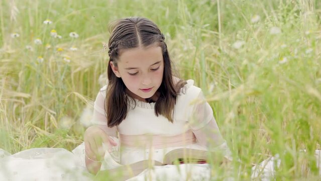 Hispanic girls reading vintage bible in communion. Christian education. slow motion 4k handheld