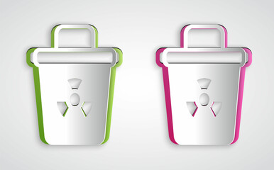 Paper cut Infectious waste icon isolated on grey background. Tank for collecting radioactive waste. Dumpster or container. Biohazardous substances. Paper art style. Vector