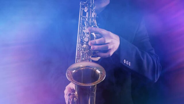 Stage Lights Glow And Flare On Saxophone Player