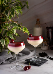 Food photography of panna cotta, dessert, mousse, cherry
