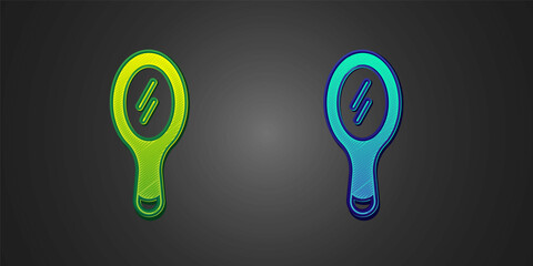 Green and blue Hand mirror icon isolated on black background. Vector