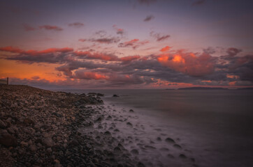 Sunrise on Reis Magos beach. Canico, Madeira, Portugal. October 2021. Long exposure picture
