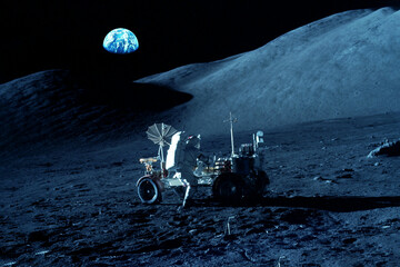 Astronaut on the moon, near the moon rover. Elements of this image furnished by NASA