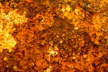 Saturated orange color stone surface. Abstract background texture.