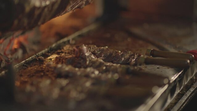 Details of the master and delicious kebab making Turkish kebab by the hearth